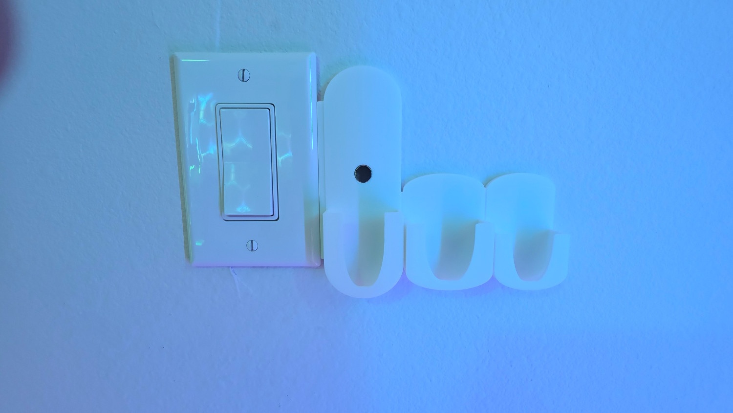 Remote mount installed on wall with remote